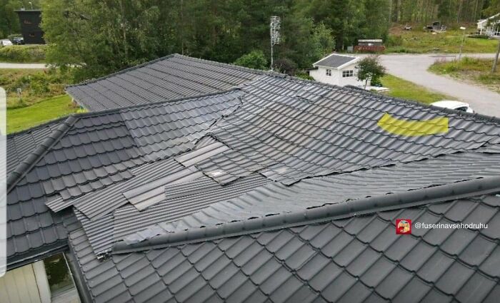 Roof construction with poorly aligned tiles creating a flawed design, an example of construction and designs fails.