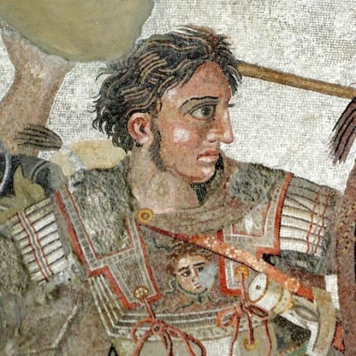 Ancient mosaic showing a warrior in detailed armor, illustrating vivid history anecdotes from the past.