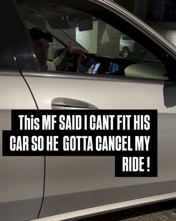 Lyft driver seen inside a car during a denied ride incident related to weight discrimination and lawsuit settlement.