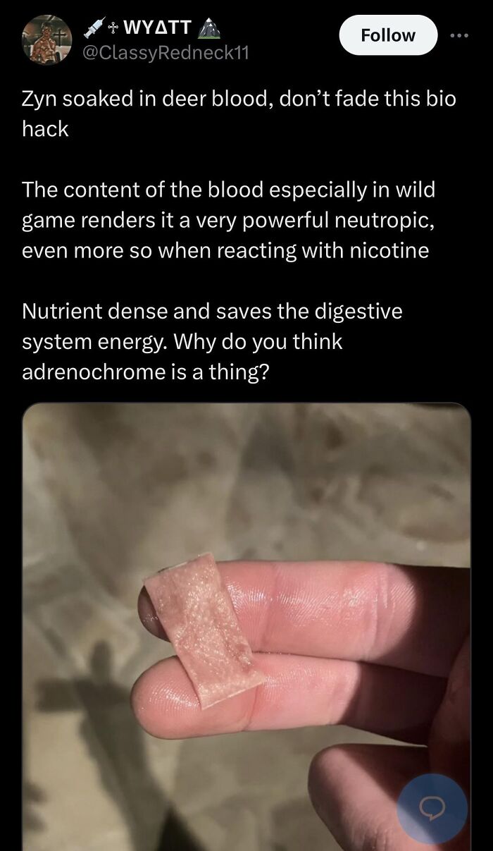 Hand holding a small piece of deer blood-soaked material, related to edible survival and close-to-death experiences.