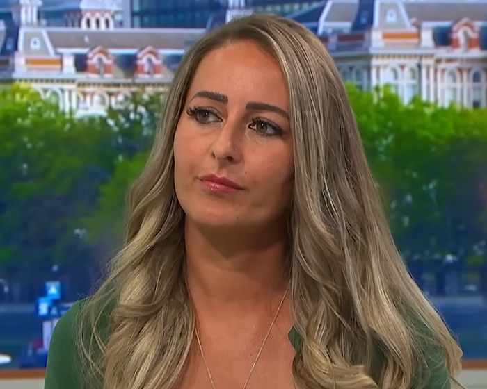 Domestic violence victim with long blonde hair shares how Siri helped during a frightening attack in an interview setting.