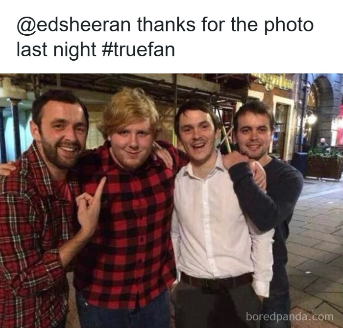 Four men posing in a street photo, with one man humorously mistaken for a celebrity in a Johnny Derp moment.