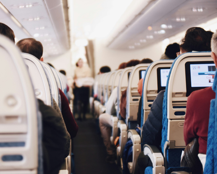 Plane Passenger Furious At 'Loud' Family's Behavior After He Paid For Extra Legroom