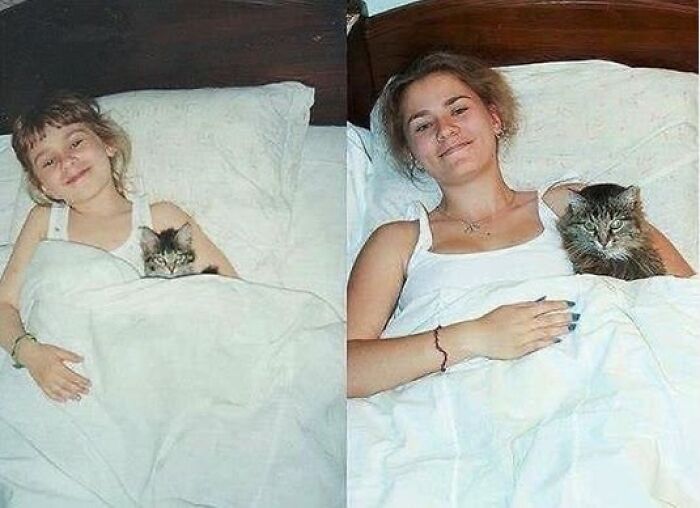 Young girl and adult woman lying in bed with a cat, showcasing the wholesome connection between humans and animals.