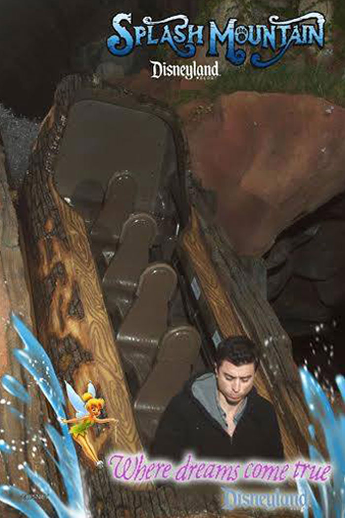 Splash Mountain log flume ride photo featuring a man on a log boat at Disneyland amusement park.