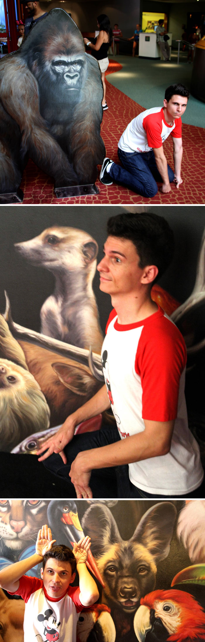 Young man posing with animal murals at an amusement park, showcasing fun and creative photos people brought home after a trip.