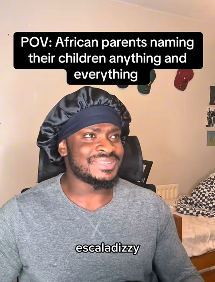 Man in a black satin bonnet smiling with text about African names people can’t believe are real. Man in a black satin bonnet smiling with text about African names people can’t believe are real.