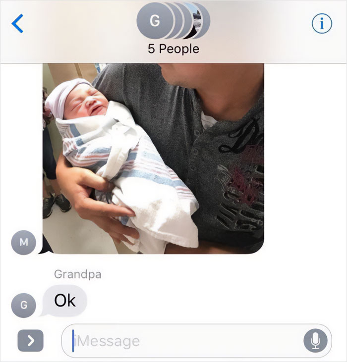Text message showing a photo of a newborn, with a grandpa replying simply with OK, highlighting older people failing at technology.
