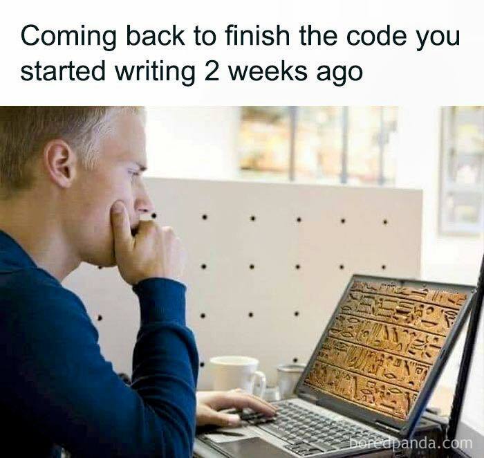 Programmer looking confused at laptop screen showing complex ancient script, illustrating funny memes programmers created.