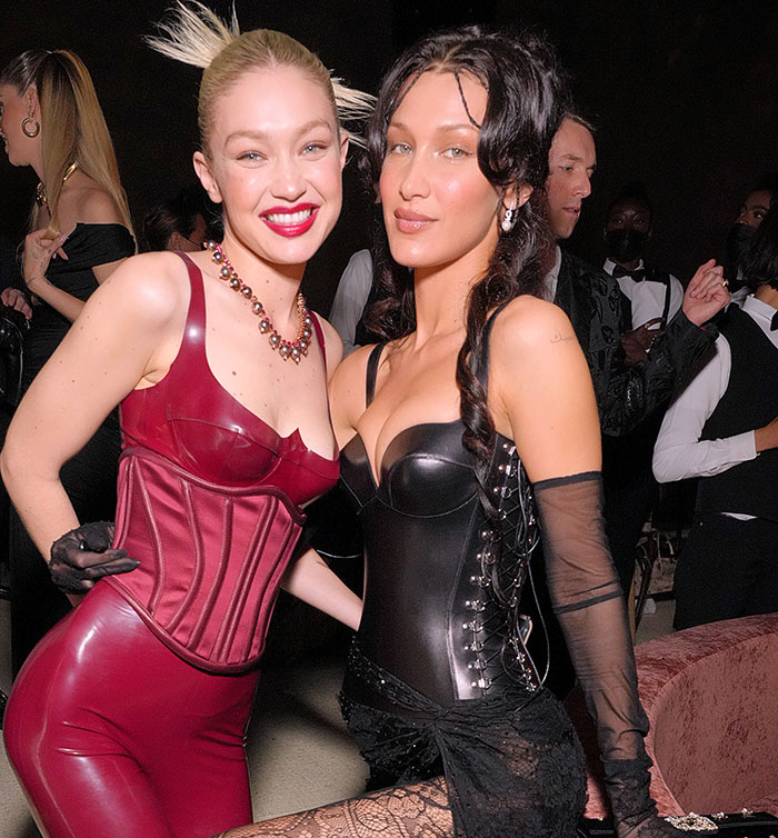 Bella Hadid poses at event, highlighting years of invisible suffering with alarming hospital photos shared online.