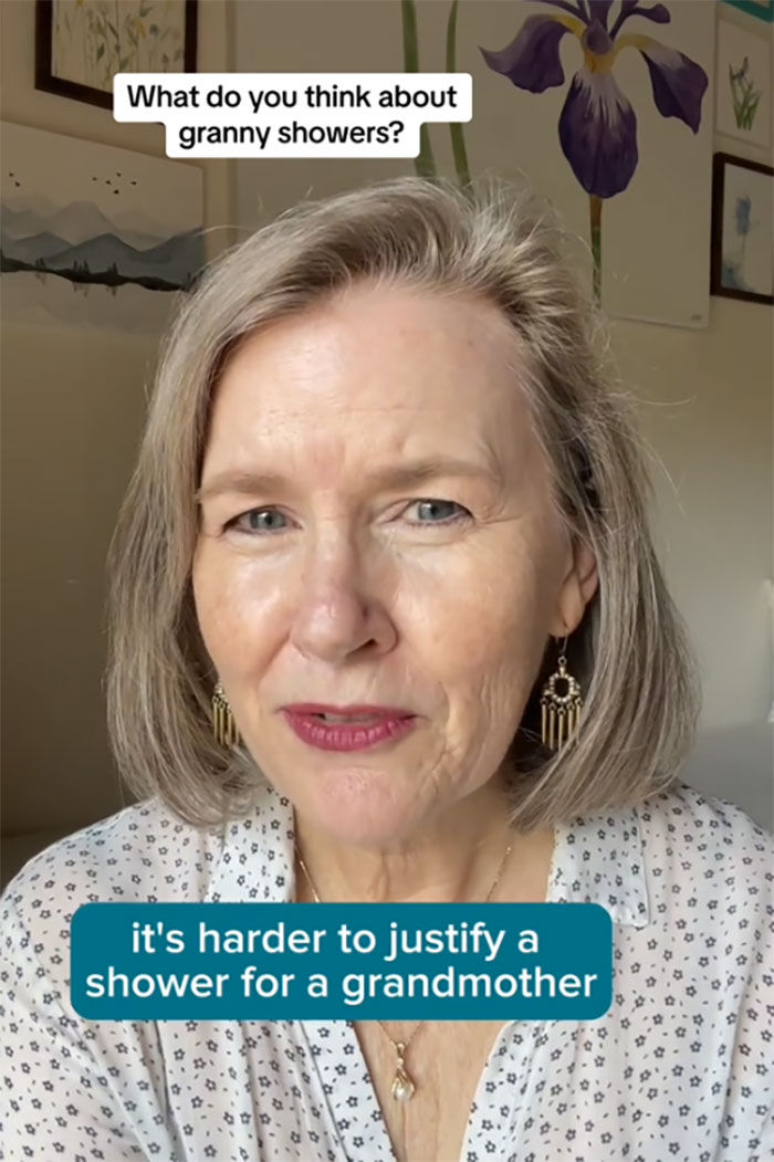 Middle-aged woman discussing opinions on grandmas having a baby shower to celebrate their new status at home.