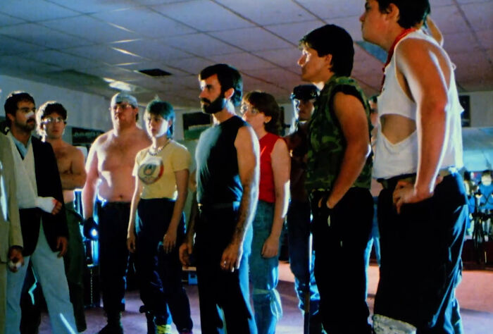 Group of characters in a cult classic scene from one of the worst-best movies that people actually enjoy.