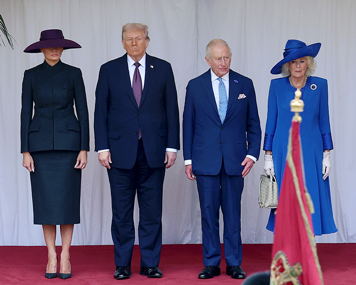 Melania Trump and others standing formally during UK state visit, highlighting wardrobe choices and hidden messages. Melania Trump and others standing formally during UK state visit, highlighting wardrobe choices and hidden messages.