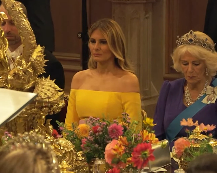Melania Trump in a yellow off-shoulder dress during the UK state visit, highlighting wardrobe choices and hidden messages. Melania Trump in a yellow off-shoulder dress during the UK state visit, highlighting wardrobe choices and hidden messages.