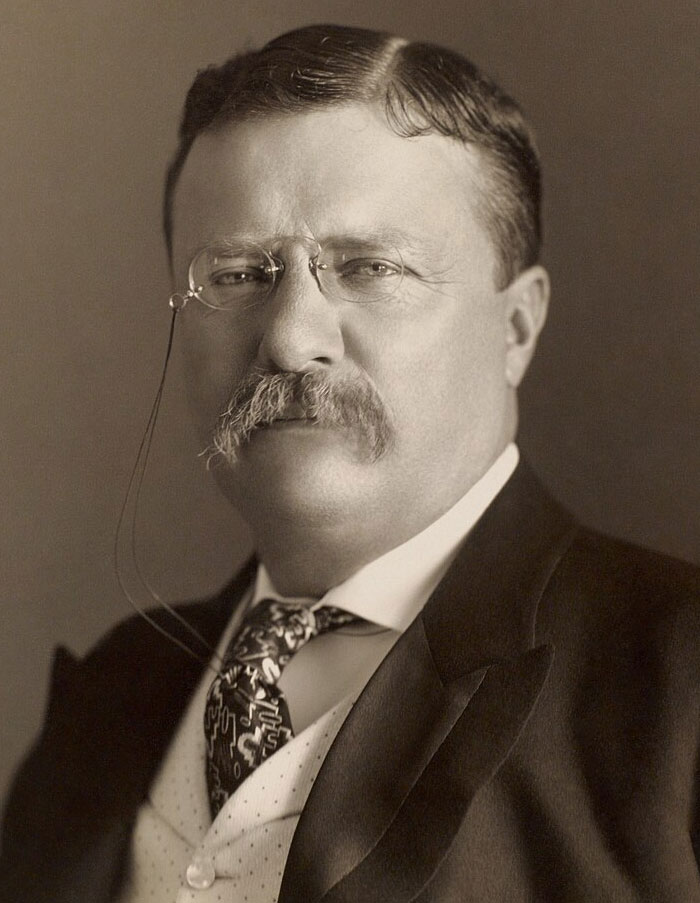 Vintage portrait of a man with glasses and mustache, representing weird and iconic bruh moments in history.