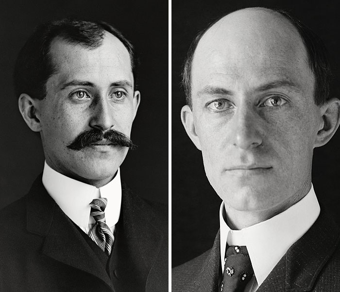 Black and white portraits of two men in early 20th century attire representing weird and iconic bruh moments in history.