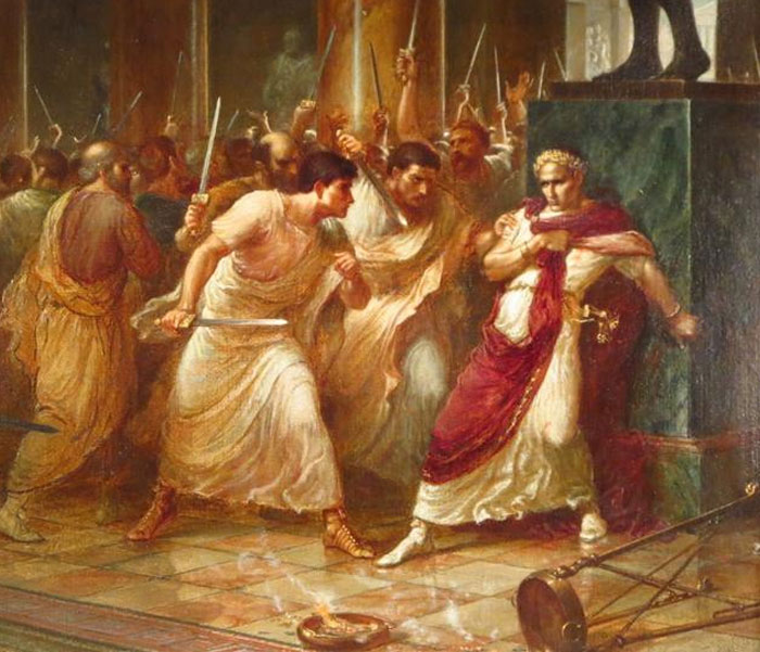 Ancient men in togas with swords facing a man in a toga with a red sash in an iconic bruh moment in history.