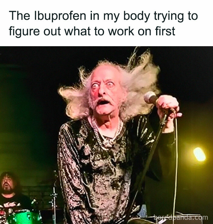 Elderly man with wild hair performing on stage, capturing nostalgic moments that remind people of old age.