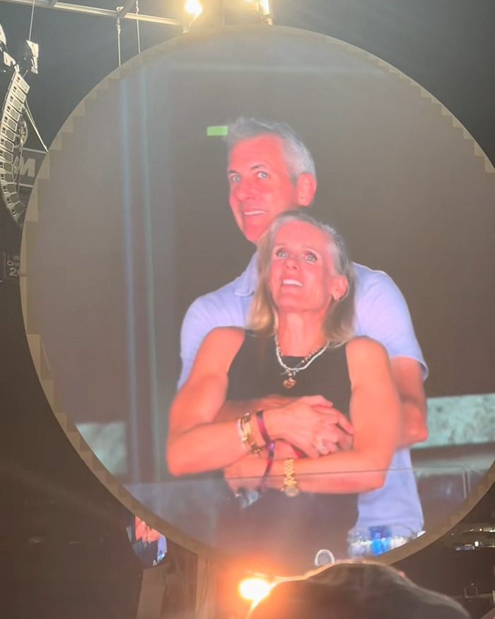 Couple embraced and smiling on Coldplay KissCam at concert, highlighting unexpected twist in HR exec&rsquo;s story.