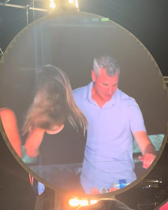 Couple featured on Coldplay KissCam screen during concert, capturing an unexpected twist in the KissCam saga.