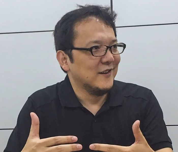 Man wearing glasses and a black shirt explaining 82 facts for daily dose of useless yet fascinating knowledge.