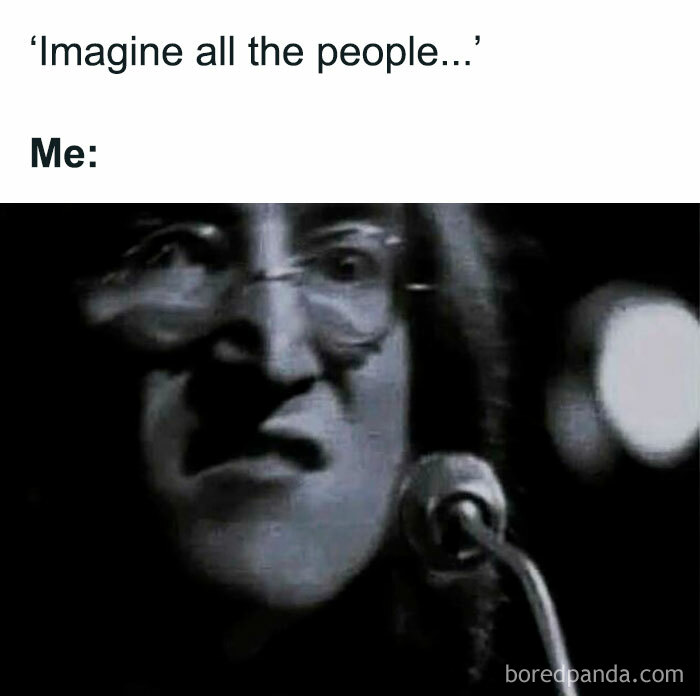 Black and white close-up of a person making a confused face, representing introvert memes after socializing.