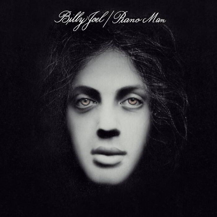 Album cover featuring a blurred, eerie face with dark eyes and hair on a black background, representing worst album covers.