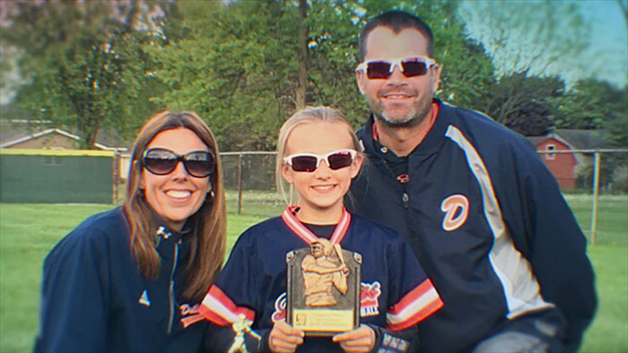 Family photo of mom who anonymously sent daughter lewd texts, showing support before sentencing outdoors in sports attire. Family photo of mom who anonymously sent daughter lewd texts, showing support before sentencing outdoors in sports attire.