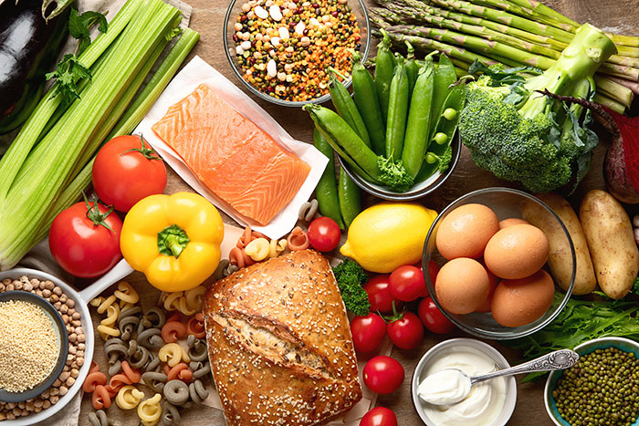 Various fresh foods including bread, salmon, vegetables, eggs, and legumes linked to dementia risk in a scientific study. Various fresh foods including bread, salmon, vegetables, eggs, and legumes linked to dementia risk in a scientific study.