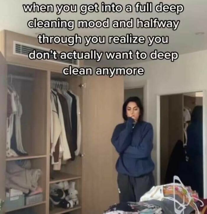 Person standing in a room with open closet, reflecting a funny and weirdly comforting mental health meme about motivation loss.