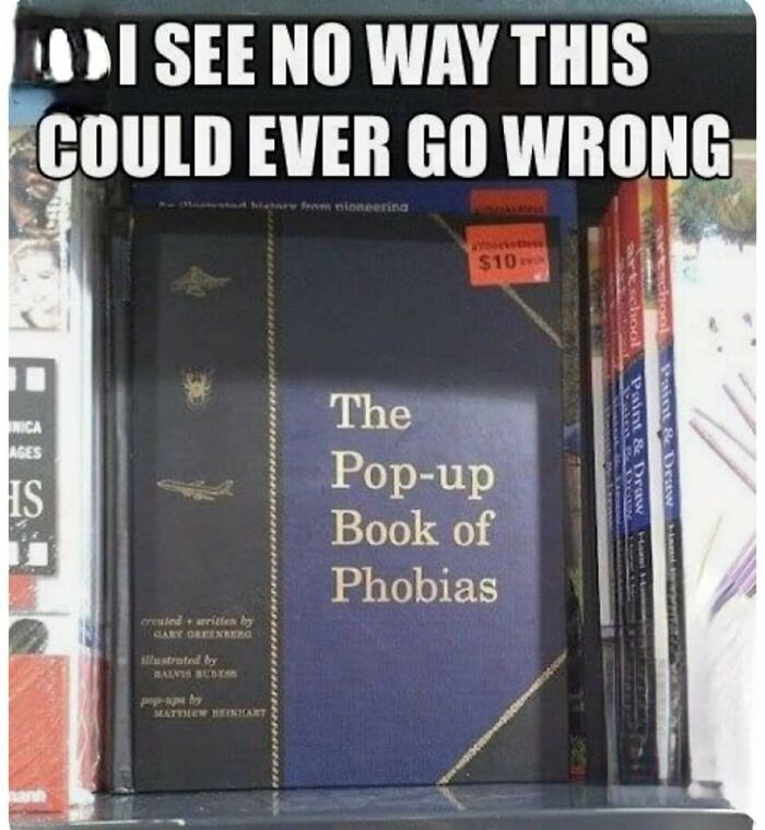 Book titled The Pop-up Book of Phobias shown on a shelf with humorous mental health meme text overlay.