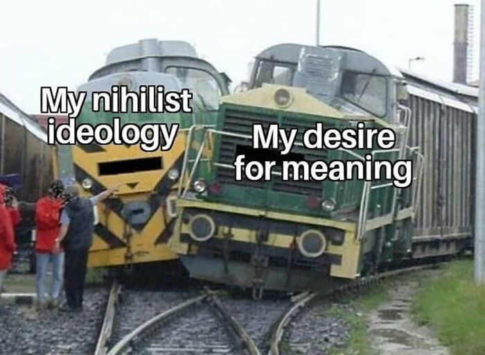 Two trains collide on diverging tracks labeled with mental health memes about nihilist ideology and desire for meaning.