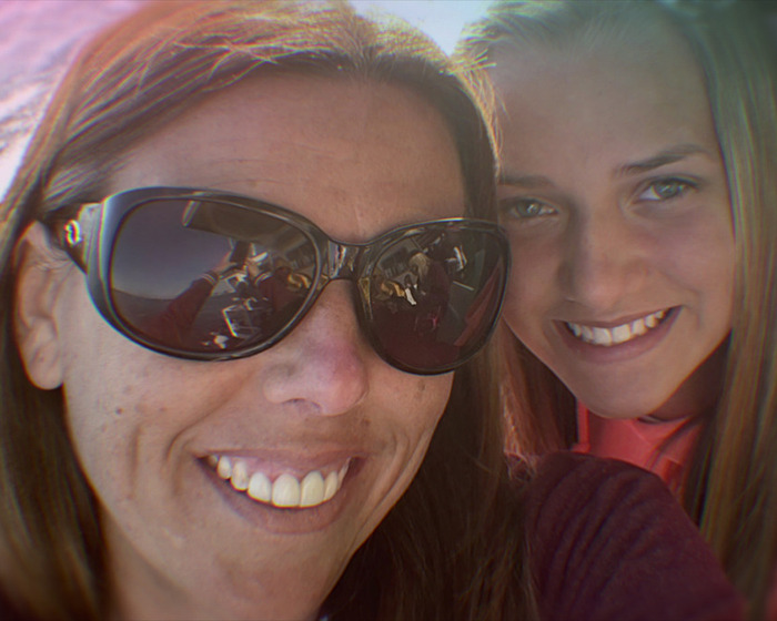 Mother and teenage daughter smiling closely, illustrating psychological expert insights on online anonymous bullying effects. Mother and teenage daughter smiling closely, illustrating psychological expert insights on online anonymous bullying effects.