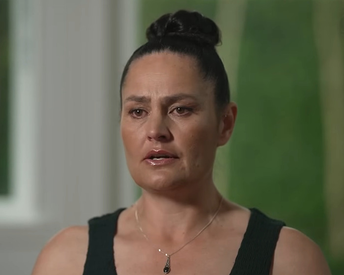 Woman appearing in court over DUI case while her 3 kids are missing, captured in a close-up indoor setting.