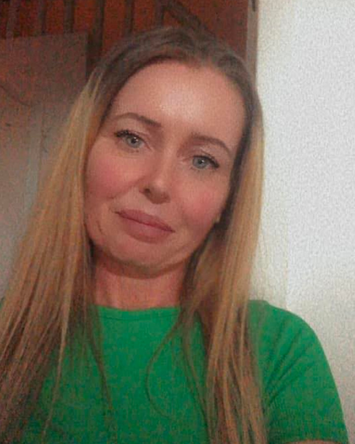 Woman with long blonde hair wearing a green shirt, representing mom of student jailed for life in Dubai lashing out at haters. Woman with long blonde hair wearing a green shirt, representing mom of student jailed for life in Dubai lashing out at haters.