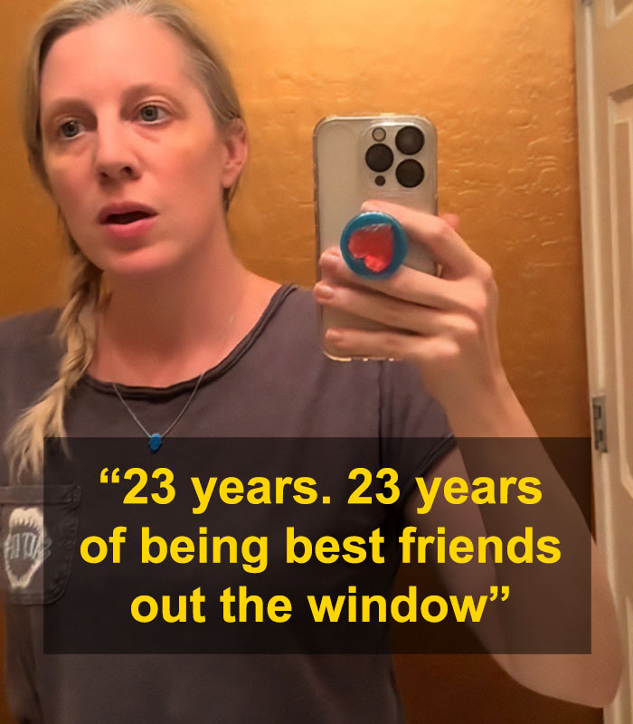 Woman shocked taking mirror selfie after best friend ends 23-year friendship over mom shorts issue.