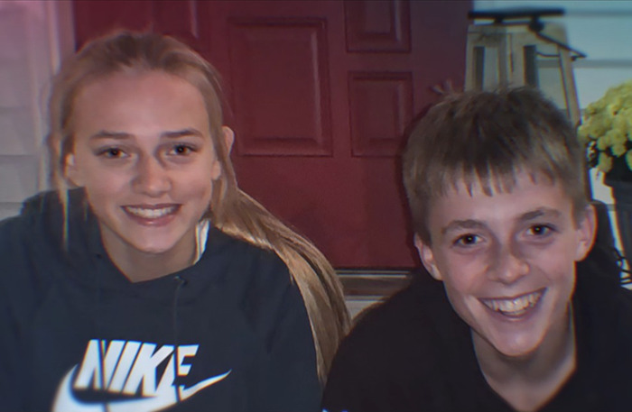 Teenage girl and boy smiling outside a house, related to mom makes shocking confession about bullying daughter.