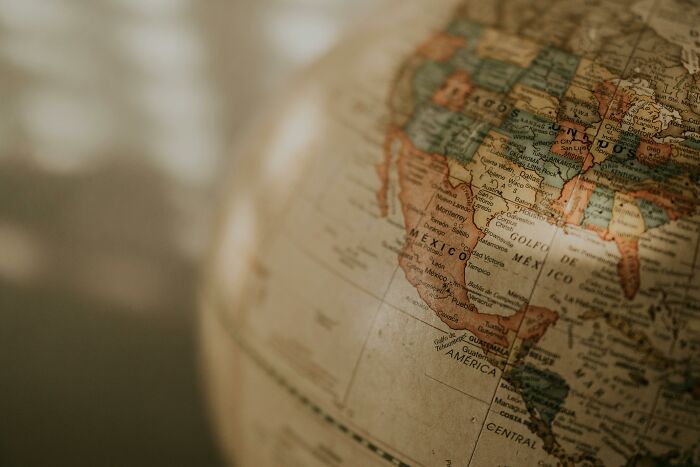 Close-up of a vintage globe showing Mexico and surrounding countries, illustrating country nicknames for SEO content.