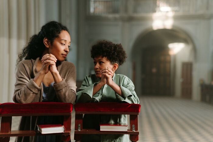 A woman and child spending time together in a quiet space, reflecting on things people used to spend hours doing.