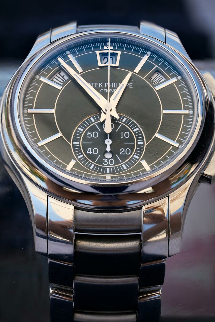 Close-up of a luxury wristwatch representing jobs that exist solely for ultra-wealthy people and their lifestyles.