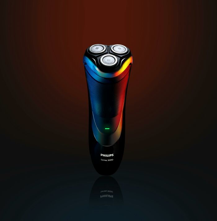Electric shaver illuminated with colorful light, representing companies that sabotage their own products revealed by netizens.