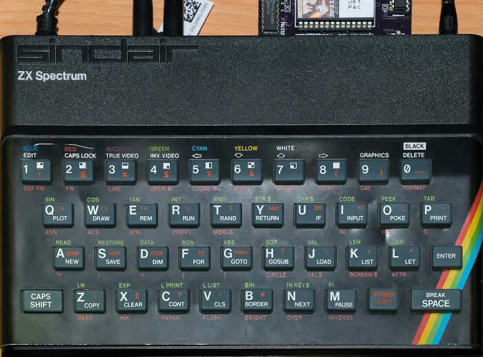 Retro ZX Spectrum vintage toys worth fortune with colorful keyboard and classic 1980s computer design