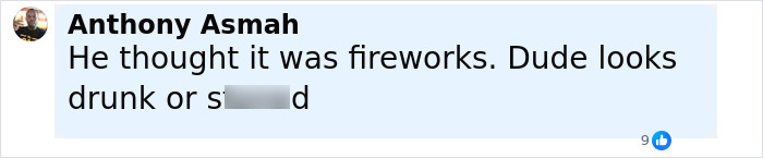 Man with a beard cheering and looking back in a crowd during Charlie Kirk's attack incident.