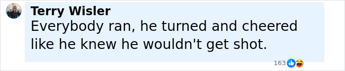 Comment by Terry Wisler describing a mystery bearded man in crowd cheering and looking back during an attack event.