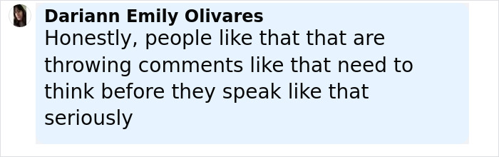 Screenshot of a social media comment defending a Dancing With The Stars pro after trolls criticize her 3-year-old son's appearance.