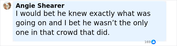 Alt text: Mystery bearded man in crowd spotted cheering and looking back during chaotic event involving Charlie Kirk's attack.