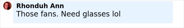 Comment saying Those fans need glasses lol in black text on light blue background with profile picture of a woman with glasses and red hair.