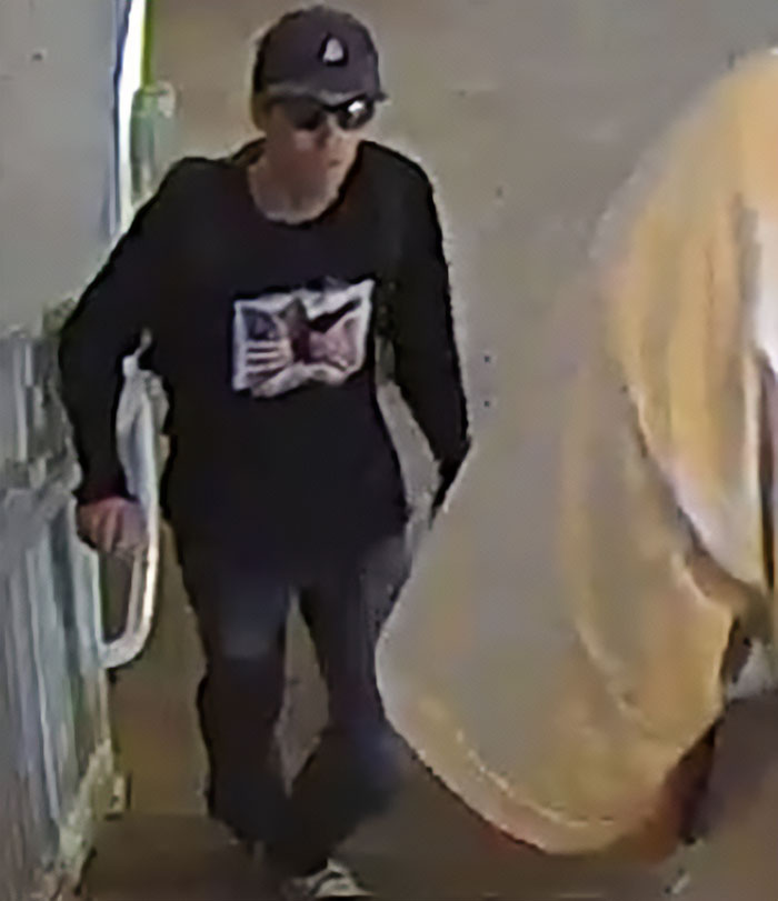 Main suspect in Charlie Kirk fatal attack seen in CCTV footage wearing black shirt, cap, and sunglasses during daring escape.