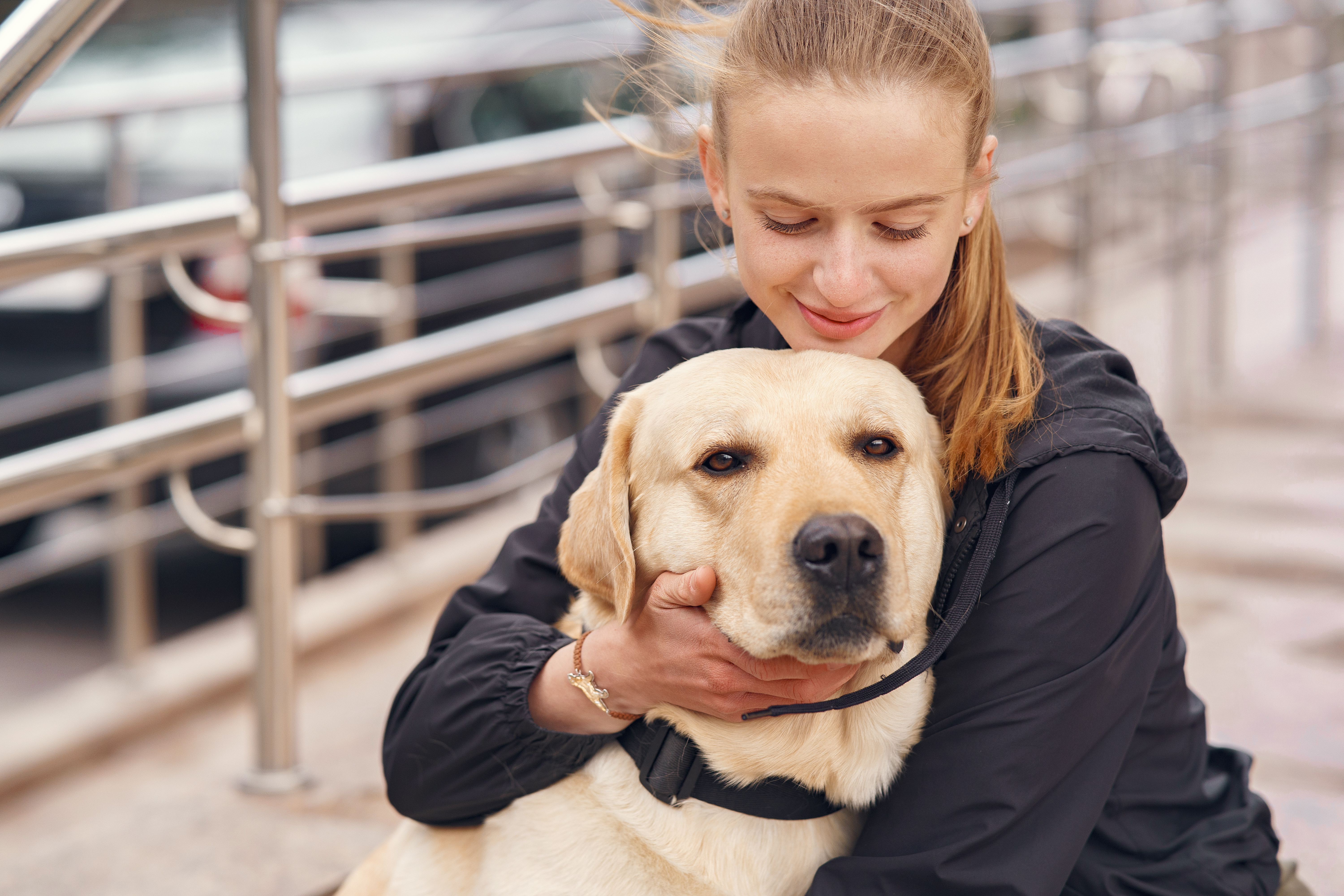 Young woman hugging a golden retriever service dog, reflecting on bride refusing SIL’s service dog at her wedding debate. Young woman hugging a golden retriever service dog, reflecting on bride refusing SIL’s service dog at her wedding debate.