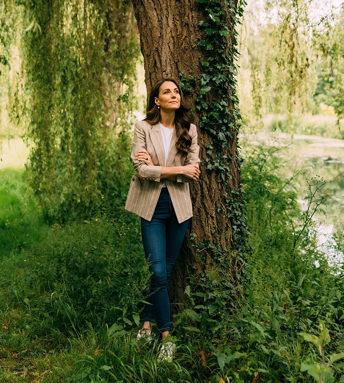 Kate Middleton standing thoughtfully by a tree outdoors as Princess Diana's hairdresser defends against trolls. Kate Middleton standing thoughtfully by a tree outdoors as Princess Diana's hairdresser defends against trolls.